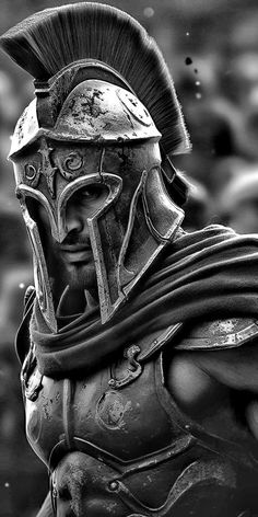 a black and white photo of a roman soldier in full armor with his head turned to the side