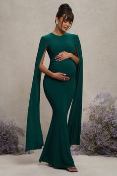 Divine Timing Bottle Green Maternity Maxi Dress With Cape Sleeves – Club L London - USA Green Maternity Dress, Dress With Cape Sleeves, Green Maternity Dresses, Uzun Boy, Dress With Cape, Long Cape, Sleek Bun, Maternity Maxi Dress, Divine Timing