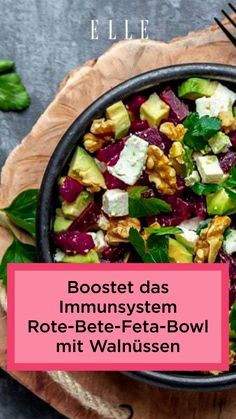 a bowl filled with beets, avocado and feta