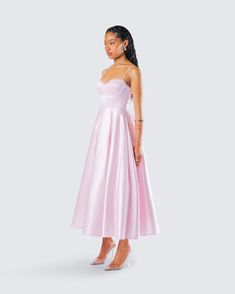 Trying to get courted? 😌 Be the diamond they’ve all been looking for in this pink satin midi dress complete with lace detailing at the neck, a fit & flare style, a built-in tulle underskirt, and adjustable straps 💕 Pink Tea Length Evening Dress, Pink Tea-length Evening Dress, Wedding Fit And Flare Tea Length Dress, Elegant Pink Midi Dress With Pleated Bodice, Glamorous A-line Midi Dress For Prom, Knee-length Satin Dress For Homecoming, Prom Season Slip Dress With Fitted Bodice, Pink Satin Evening Dress For Spring, Spring Satin A-line Dress With Fitted Bodice