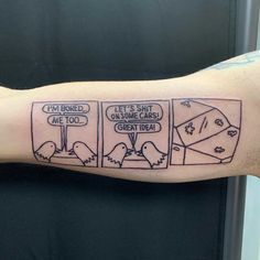 a man's arm with three comics on it