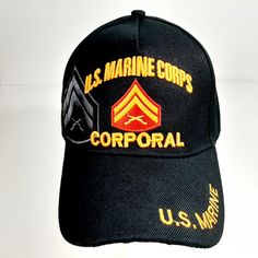 Us Marine Corps Corporal Men's Ball Cap Hat One Size Black Acrylic Adjustable Size Strap Back Embroidered Or Iron Pressed Patch Hat Material Varies From Acrylic, Polyester, Wool And Cotton Blends New With Or Without Tags Military Style Sports Hat, Black Military Hat With Curved Bill, Black Military Baseball Cap With Flat Bill, Military Style Black Baseball Cap With Flat Bill, Black Military Flat Bill Baseball Cap, Military Style Black Snapback Cap, Black Military Style Flat Bill Baseball Cap, Black Military Baseball Cap One Size, Black Military Snapback Hat With Curved Bill