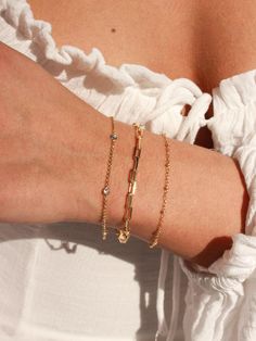 *Buy any 2 items, Get 15% OFF your order. Coupon applied at checkout.* * Single Paperclip Chain Bracelet * Gold Filled * Size Length options: 5", 5.5", 6", 6.5", 7" all sizes have the option of adding a 1" extender * Thickness: 3mm ►WHY GOLD FILLED? If you have been on the search for everyday gold jewelry that doesn't tarnish but affordable, gold filled is the best choice! Gold filled jewelry is second best after solid gold jewelry. *Our Gold filled jewelry has an outer layer of 14k or 18k gold that is pressure bonded to a base metal of jewelers brass or sterling silver. * Our gold filled jewelry can withstand normal body sweat, body oils, and is typically water resistant. ►JEWELRY CARE: Take extra care of your new jewelry to maximize its lifespan: *Try to avoid contact with chlorine, salt Delicate Chain Bracelet With Oval Links For Gifts, Gift Bracelet With Delicate Oval Link Chain, Delicate Oval Link Chain Bracelets As Gift, Adjustable Oval Link Chain Bracelet For Gift, Adjustable Oval Link Chain Bracelet As Gift, Delicate Oval Link Chain Bracelet As Gift, Chain Link Charm Bracelet With Strap As Gift, Chain Link Charm Bracelet With Bracelet Strap As Gift, Oval Link Bracelet For Gift