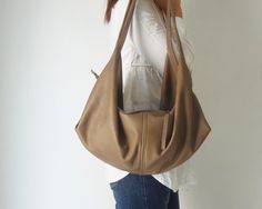 Taupe leather shoulder bag - Women slouchy leather purse - Large leather bag - Soft leather bag - DeLUNA bag Taupe Leather Shoulder Bag, Neutral Leather Hobo Bag For Everyday, Modern Soft Leather Shoulder Bag In Taupe, Everyday Neutral Leather Hobo Bag, Modern Soft Leather Taupe Shoulder Bag, Modern Taupe Soft Leather Shoulder Bag, Neutral Leather Tote Shoulder Bag, Neutral Leather Shoulder Bag With Double Handle, Taupe Leather Hobo Bag For Daily Use