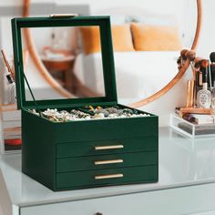 Upgrade your storage with our sleek 4-layer jewelry organizer. Designed for elegance and functionality, it features a stylish glass lid for a clear view of your cherished items. With three spacious drawers, it's perfect for organizing jewelry, sunglasses, and other accessories. Whether decluttering your space or adding a touch of sophistication to your vanity, this jewelry organizer is the ideal solution. Keep your precious items beautifully displayed and easily accessible with our modern 4-laye Organizing Jewelry, Layer Jewelry, Jewellery Organizer, Leather Organization, Faux Leather Fabric, Layered Jewelry, Clear View, Jewelry Organizer, Box Color