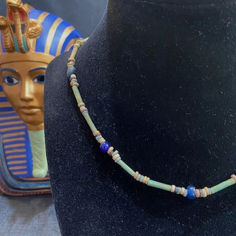 An ancient Egyptian 17 inch long necklace featuring blue/green tubular and disc shaped faience beads and blue glass beads.  Circa 300 to 50 BC Estate Jewelry, Blue Glass, Anniversary Rings