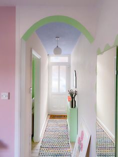 the hallway is decorated in pastel colors