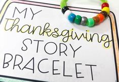 a sign that says, my thanksgiving story bracelet