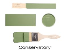 a paintbrush and some green paints with the words conservatory on it