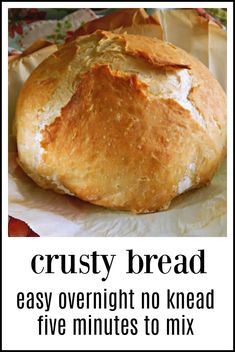 a loaf of bread sitting on top of a piece of paper with the words crusty bread easy overnight no knead five minutes to mix