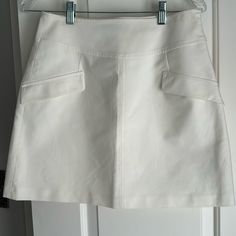 Zara Mini Skirt Lying Flat Measures Hip To Hip 14” Across And Hem To Hem 17” Long. Pockets Are Detail Only With Zippered Side Closure. White Relaxed Skort With Pockets, White Fitted Mini Skirt With Pockets, Fitted White Mini Skirt With Pockets, Chic Skirted Skort With Pockets, White High Waist Mini Skirt With Pockets, White Mini Skort For Workwear, Chic White Mini Skirt With Pockets, High Waist White Mini Skirt For Work, White Mini Skirt With Pockets For Work