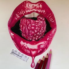 a drawing of a raspberry lips and some colored pencils