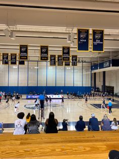 A college gym full of female volleyball players, along with coaches, referees, and supporters of the sport. the left side, wearing white, is the Emory University team. the right side, who wears a dark blue, is the East Texas Baptist University team College Volleyball, Volleyball Team, University Student, Food Snapchat, Volleyball, Vision Board, Snapchat