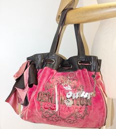 Rare Authentic High-Quality Vintage JUICY COUTURE Pink Day Dreamer Velour Bag, Fashion y2k Hand Bag, Vintage Juicy Couture Bag, Gift for Her Good Condition Vintage Genuine Leather Juicy Couture Bag with large Heart Charm Signs of wear and tear, see photos. Good overall exterior and peeling to the inside pockets and the little attached mirror strip, see last photos.  Small scuff to one of the corners as seen in 3rd photo. Pink/Coral Please see more Juicy Couture bags here: https://www.etsy.com/uk Pink Vintage School Bag, Y2k Style Shopping Bags, Vintage Pink School Bag, Y2k Pink Shoulder Bag, Y2k Style Leather Bag For Daily Use, Y2k Leather Bag For Daily Use, Y2k Style Satchel Bag For Daily Use, Pink Y2k Shoulder Bag For Daily Use, Y2k Style Pink Bag For Everyday Use