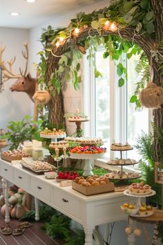 a table filled with lots of food next to a window