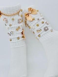 Indulge in the opulence of our gold embellished junk socks, where comfort meets extravagance. Crafted from the finest materials, these unique socks feature exquisite gold detailing that elevates your loungewear to a statement of luxury. Perfect for those who appreciate the art of casual elegance, they offer a delightful blend of whimsy and sophistication, making them an essential addition to your wardrobe. Embrace the allure of indulgence with every step you take. Charm Socks, Junk Socks, Bling Socks, Gold Socks, Balloon Bouquet Diy, Slouch Socks, Bling Shirts, Unique Socks, Gold Embellishment