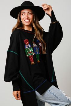 The Sequin Nutcracker Sweatshirt is perfect for any occasion. It features a round neckline, color blocked seams, long balloon sleeves, a high-low hem, and a loose fit. Created with French terry fabric and shining sequins, this stylish sweatshirt will keep you comfortable and looking your best. It is meant to be OVERSIZED! Curvy Rompers, Sequined Sweatshirt, Activewear Print, Long Balloons, Curvy Dress, French Terry Fabric, Nutcracker Christmas, Sweater Set, Balloon Sleeves