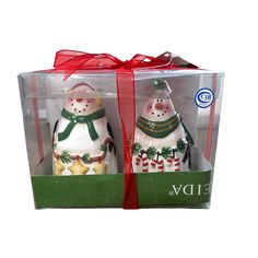 two snowmen are in a gift box