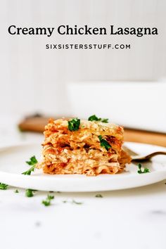 a close up of a plate of food with text overlay that reads creamy chicken lasagna