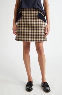 The schoolcore influences seen throughout the 2024 runways shine through the retro plaid of this silk-kissed wool miniskirt flanked by soft corduroy pockets. Side zip closure Front flap pockets 99% virgin wool, 1% silk Dry clean Made in Italy Designer Clothing Classic Wool Mini Skirt, Preppy Mini Skirt For Workwear, Preppy Mini Skirt For Work, Plaid Mini Skirt For Work, Preppy Fall Mini Skirt For Workwear, Preppy Mini Skirt For Fall Workwear, Preppy Lined Mini Skirt For Workwear, Plaid Mini Skirt With Lining For Work, Plaid Lined Mini Skirt For Work