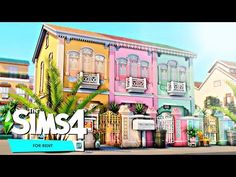 the sims 4 house is shown in front of palm trees and other colorful buildings