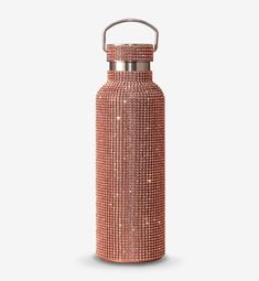 thermos bottle is made from metal and decorated with pink beads, which are accented with silver