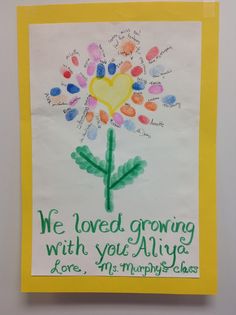 a child's handprinted card with a heart and flowers on it that reads, we loved growing with you aliya