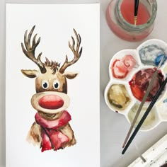 a watercolor painting of a reindeer wearing a red scarf