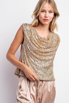 wide neck sleeveless sequin top Brand: L Love Style: LVC3194 Fabric: 100% polyester Details: SEQUINS SLEEVELESS ASYMMETRIC TOP -DRAPED NECKLINE -SLEEVELESS -PLEATED SHOULDER MODEL HEIGHT 5'8" 34" 24" 34" Loose Crop Top, Bandage Crop Top, Sheer Crop Top, Asymmetric Top, Draped Neckline, Balloon Sleeve Dress, Bodycon Dress With Sleeves, Love Style, Ruffle Hem Dress