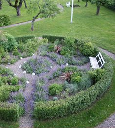 an aerial view of a circular garden area