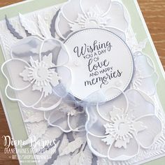 a close up of a card with flowers on it