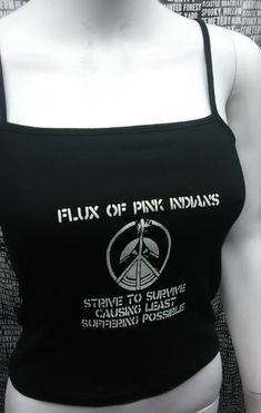 This is a black Flux of Pink Indians crop tank top with spaghetti straps. This has a Flux image screen printed on the front. 57% cotton/ 38% polyester/ 5% SpandexThese are handmade screenprinted and slightly vary from the photo. Please feel free to email me any questions. Thanks for looking.Due to an influx of incorrect addresses if a package is returned,  you must pay the shipping cost to resend the item to you.I do not do exchanges and I do not take returns unless the item is damaged. I thorou Fitted Black Crop Top Band Merch, Black Sleeveless Tank Top For Rave, Summer Band Merch Cotton Crop Top, Black Cotton Band Merch Crop Top, Alternative Black Cotton Crop Top, Black Cotton Crop Top With Screen Print, Black Screen Print Cotton Crop Top, Summer Cotton Crop Top Band Merch, Summer Cotton Crop Top For Band Merch