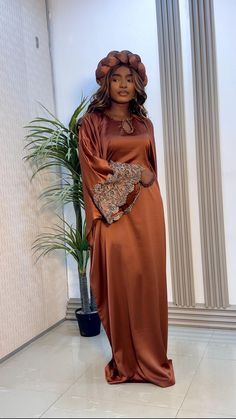 Indulge in elegance with our Luxury Silk Bubu in Brown. Crafted with the finest silk, this stunning gown features intricate lace detailing and a unique cutout. Stunning Gowns, Luxury Silk, Muslim Fashion, Dress Clothes For Women, Silk Dress, Lace Detail, Halloween Shopping, Dress Outfits, Bathing Beauties