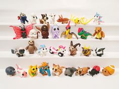 there are many different toy animals on the shelves