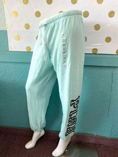 Victoria's Secret Pink Logo Classic Pant Sweatpants Mint Green New with tag Drawstring Waistband PINK by Victoria's Secret Classic Pant Logo print on one side Cinch Ankle Sweatpant Cozy Material SORRY, WE DO NOT SHIP INTERNATIONAL !!! Payment must be made within 3 days after Auction end Thank you Shipping Information US Shipping only : Shipping will be made by USPS First Class or Priority Mail, whichever is aprropriate according to the weight for inside of United States. Insurance: Optional at b Sporty Loungewear Bottoms From Victoria's Secret, Casual Cotton Bottoms By Victoria's Secret, Victoria's Secret Casual Cotton Bottoms, Spring Loungewear Pants By Victoria's Secret, Victoria's Secret Casual Cotton Pants, Victoria's Secret Pink Casual Pants, Victoria's Secret Loungewear Pants For Spring, Victoria's Secret Spring Loungewear Pants, Victoria's Secret Casual Long Pants