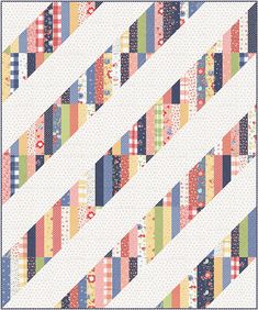 a colorful quilt is shown with many different colors and patterns on the fabric, including stripes