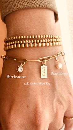 Customize your own Stories Charm bracelet! Explore our wide selection of beautiful charms to effortlessly create a unique personalized and stylish accessory. You can wear it daily, whether swimming or bathing, 24/7, without any worries. If you order the tag and birthstone, please leave a message. For example: C (heart) J and birthstones for May and July. Our charms options:1. Tag - Tag: Stamp 4 Characters Max.2. Heart Drop - 14k gold filled3. Cross - 14k gold filled.4. Pearl Drop- 14k gold fille C Heart, 4 Characters, And July, Gold Charm Bracelet, Minimal Jewelry, Personalized Bracelets, Flower Accessories, Bracelet Gold, Dainty Jewelry