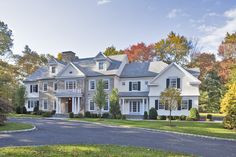 a large white house with lots of windows