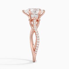 Lab Grown Garland Diamond Engagement Ring - 14K Rose Gold. Twisting vines of lustrous precious metal and diamonds sweep upwards towards two marquise-shaped diamond accents that rest on cathedral shoulders. The center gem is secured by claw prongs for a classic, elegant look (1/5 total carat weight). Rose Gold Garland, Gold Garland, Rose Gold Diamond Ring, Claw Prong, Brilliant Earth, Classic Elegant, Precious Metal, Diamond Engagement Ring, Pear Shaped