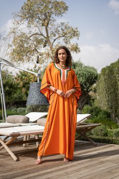 "An elegant Moroccan caftan will make you feel like African royalty. It's extremely elegant with a dash of classy cotton embroidery in the front. Ideal for plus size women as well. Made of extremely soft fabric to make you feel free and beautiful at the same time.  This Kaftan is ideal to wear for any casual occasion. Whether taking a trip down the shopping lane, or home-based kitty parties, or about anything else, wearing this dress will make you feel classy and comfortable. Fabric : 70% Egypti Traditional Orange Free Size Kaftan, Traditional Orange Tunic Kaftan, Free Size Orange Tunic Kaftan, Traditional Orange Maxi Kaftan, Summer Kaftan, Embroidered Caftan, Cotton Caftan, African Royalty, Kitty Party