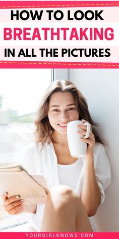 a woman sitting in front of a window holding a coffee cup and reading a book