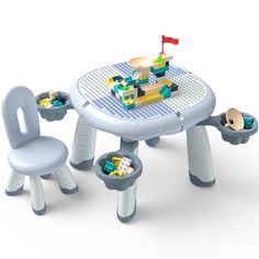 a table and chairs with legos on it