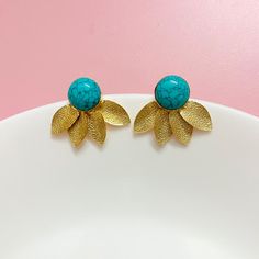 Turquoise Earrings feature striking blue Feroza stones set in gold-plated studs.  The blend of modern and classic design makes these statement studs perfect for adding a touch of elegance to any outfit. An ideal bridesmaid gift, these earrings are a stylish and thoughtful choice for someone special. *𝐏𝐑𝐎𝐃𝐔𝐂𝐓 𝐃𝐄𝐓𝐀𝐈𝐋𝐒* * 𝐌𝐚𝐭𝐞𝐫𝐢𝐚𝐥: Brass * 𝐏𝐥𝐚𝐭𝐢𝐧𝐠: Gold Plated * 𝐒𝐭𝐨𝐧𝐞: Turquoise. 𝐕𝐢𝐬𝐢𝐭 𝐎𝐮𝐫 𝐅𝐀𝐐𝐬 𝐟𝐨𝐫 𝐒𝐡𝐢𝐩𝐩𝐢𝐧𝐠 𝐏𝐨𝐥𝐢𝐜𝐢𝐞𝐬 𝐚𝐧𝐝 𝐂𝐚𝐫𝐞 𝐈𝐧𝐬𝐭𝐫𝐮𝐜𝐭𝐢𝐨𝐧𝐬 *𝐃𝐈𝐒𝐂𝐋𝐀𝐈𝐌𝐄𝐑* * Product color may slightly vary due to photographic lighting sources or your screen settings. * Stone color may vary slightly due to variations in natural stones. *𝐒𝐈𝐌𝐈𝐋𝐀𝐑 𝐃𝐄𝐒𝐈𝐆𝐍* https://www.etsy.com/listing/1746626598 https://www.etsy.co Turquoise Gold-plated Earrings For Gifts, Nickel Free Blue Gold Plated Earrings, Blue Nickel Free Gold Plated Earrings, Blue Nickel-free Gold-plated Earrings, Turquoise Earrings Gold, December Birthday Gifts, Earrings Beach, December Birthday, Earrings Turquoise