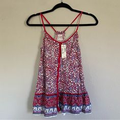 Floral Print Boho Racerback Cami Top! Buttons Down All The Way, Slight Peplum Towards The Bottom, Ruffled Around Neckline And Trims. Size: Small Material: 100% Cotton Red Printed Summer Tank Top, Red Cami Tank Top For Beach, Red Spaghetti Strap Beach Top, Red Floral Print Cami Top, Red Floral Print Summer Tank Top, Red Floral Print Tank Top For Vacation, Red Floral Print Top With Spaghetti Straps, Red Floral Print Tops With Spaghetti Straps, Red Floral Print Spaghetti Strap Tops