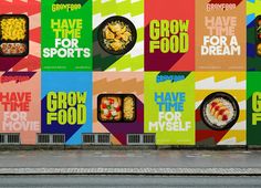 an advertisement on the side of a building with different food items in front of it