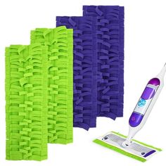 three cleaning mats and a mop on a white background with green, blue, and purple sponges