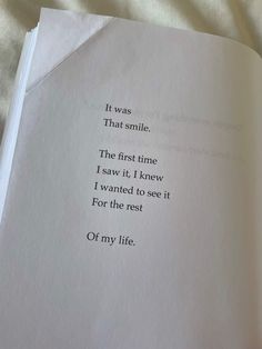 an open book with the words it was that smile, the first time i saw it i knew i wanted to see it for the rest of my life