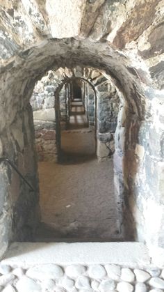 an old stone tunnel in the middle of a building