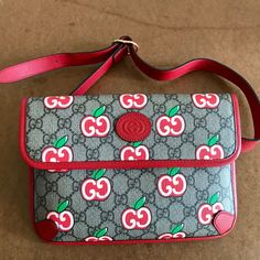 Authentic Gucci Gg Supreme Apple Belt Bag & Fanny Pack Red Leather Brand New, Unused. No Scratches Etc. I Am The Original Buyer And It Has Been Safely Stored. Pet Free Home And Well Sealed. Adjustable Strap, Inner Pockets Bag Height: 6.3 In./16cm Bag Width: 9.65 In./24.5cm Questions? Leave A Comment Below! Gucci Red Bag With Removable Pouch, Gucci Red Shoulder Bag For Travel, Gucci Red Shoulder Bag For Everyday Use, Gucci Red Shoulder Bag With Removable Pouch, Gucci Fanny Pack, Gucci Disco, Baking Measurements, Gucci Coat, Gucci Top