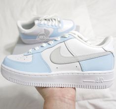 Custom Air Force 1 Blue Sneakers. Gray Swoosh. Low Tops. 🎨Artwork: -Exactly as shown in the picture. -Fully hand painted. -Applied Special Acrylic Paint for Shoes and Finisher for more Durability.  -Waterproof and flexible. -We strongly recommend the use of the Anti Crease Protectors included to prolong the durability of the paint in certain areas when feet bend. 👟Sneakers: -100 % Authentic Air Force 1 Sneakers, purchased at official stores in the US, then customized by hand.  📐Size: -C (Chil Luxury Blue Nike Air Force 1 With Round Toe, Fun Blue Affordable Sneakers, Luxury Blue Casual Custom Sneakers, Luxury Light Blue Custom Sneakers For Sports, Luxury Custom Sneakers For Sports In Light Blue, Cheap Fade-resistant Blue Sneakers, Cheap Blue Sneakers For School, Cheap Light Blue Sneakers For Sports, Nike Air Force One Blue